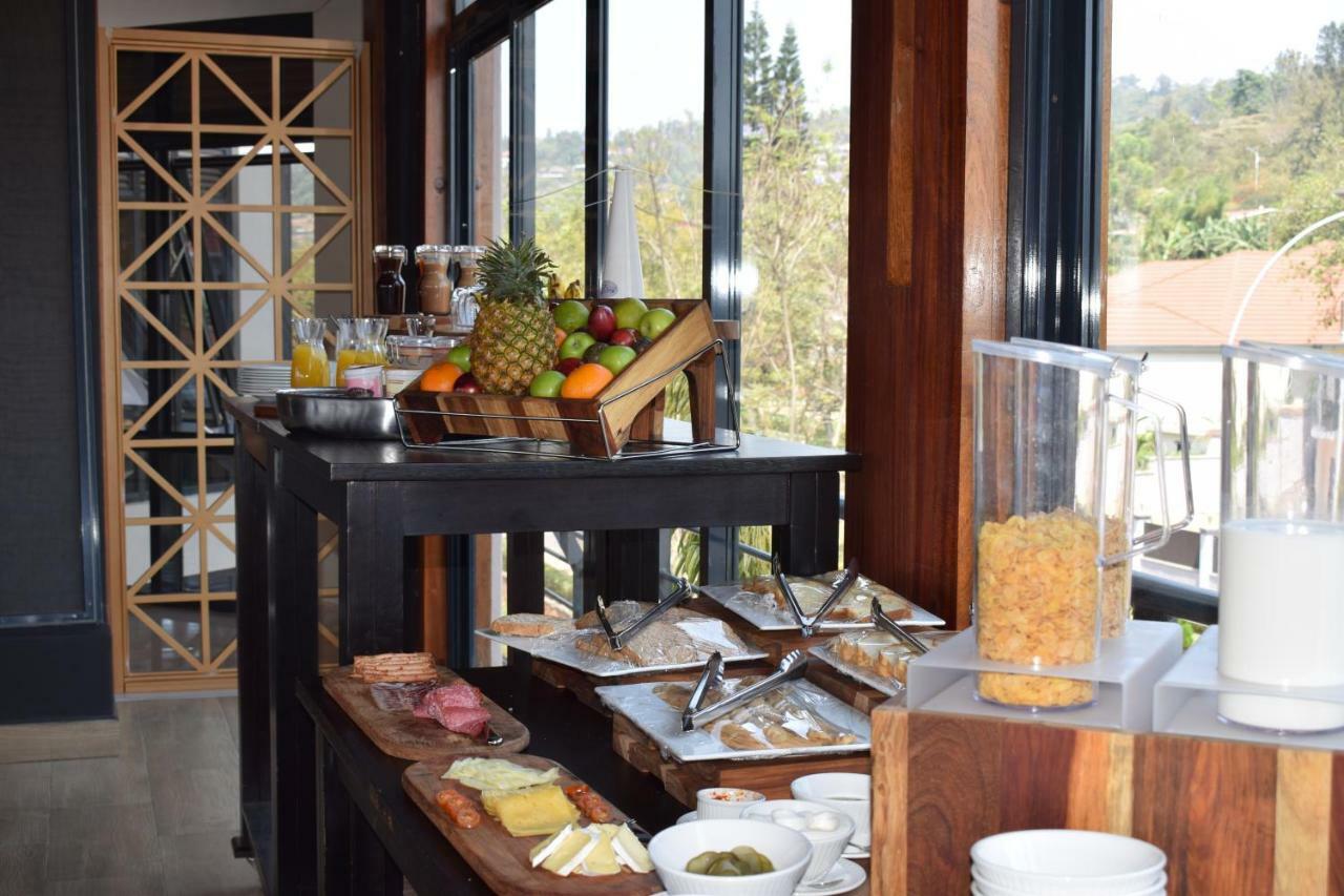 Mythos Boutique Hotel Кигали Экстерьер фото